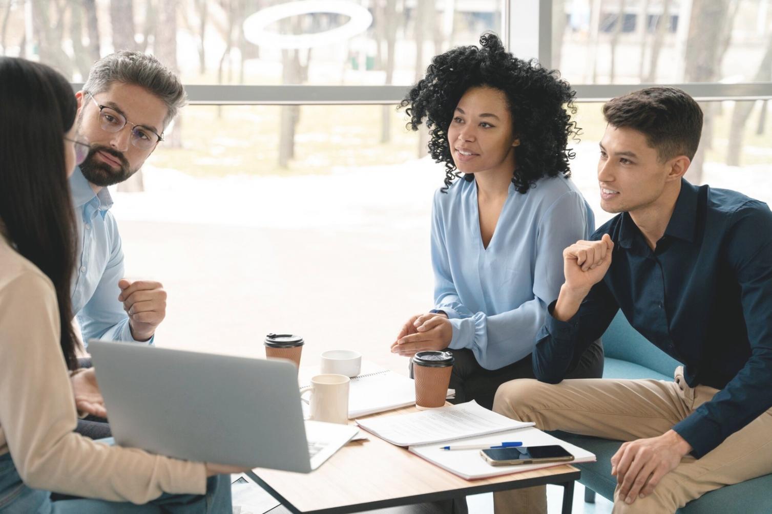 Business strategy planning with laptop and documents